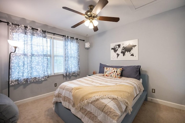 carpeted bedroom with ceiling fan