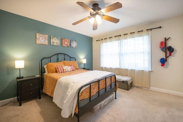 bedroom featuring ceiling fan and carpet floors