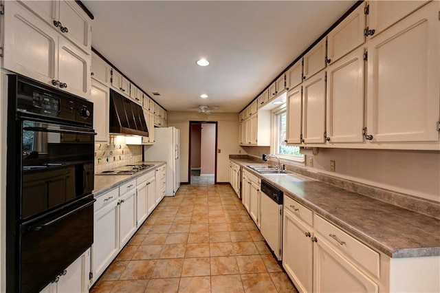 kitchen with decorative backsplash, white cabinetry, white appliances, and sink