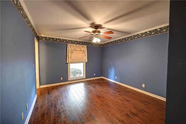 spare room featuring ornamental molding, hardwood / wood-style floors, a textured ceiling, and ceiling fan