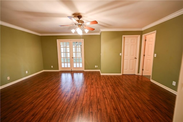 empty room with ornamental molding, ceiling fan, french doors, and dark hardwood / wood-style floors