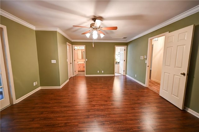 empty room with ornamental molding, dark hardwood / wood-style flooring, and ceiling fan