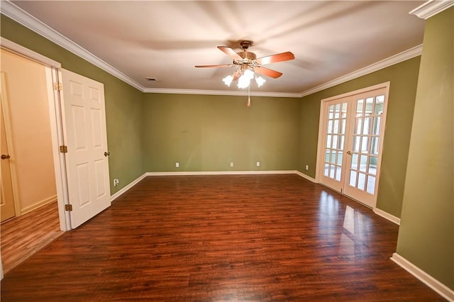 empty room with ceiling fan, dark hardwood / wood-style floors, crown molding, and french doors