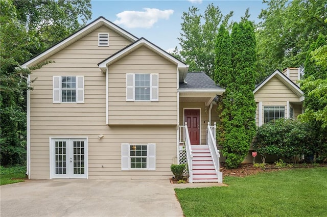 4200 Sterling Pointe Dr, Douglasville, GA 30135 - view of front of property with a front yard and french doors