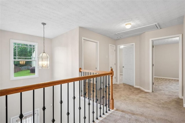2040 Village Green Dr, Fairburn, GA 30213 - hallway featuring attic access and carpet flooring