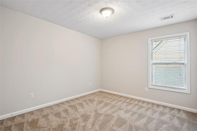 2040 Village Green Dr, Fairburn, GA 30213 - empty room with carpet floors and a textured ceiling