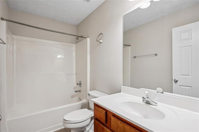 2040 Village Green Dr, Fairburn, GA 30213 - bathroom featuring a textured ceiling, vanity, and bathing tub / shower combination