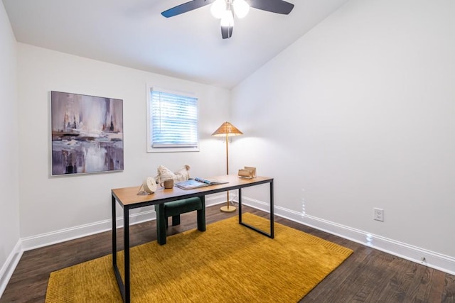 office space with dark wood-type flooring, ceiling fan, and lofted ceiling