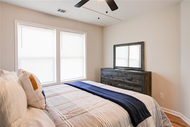 bedroom featuring ceiling fan and hardwood / wood-style floors