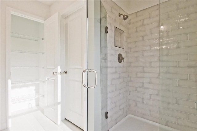 full bathroom with a shower stall
