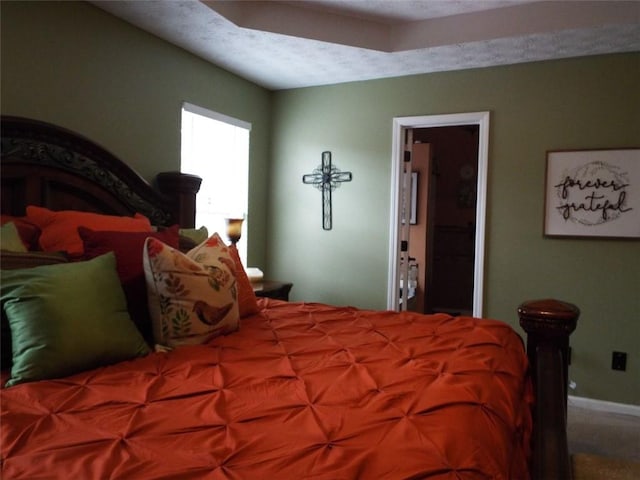 bedroom featuring a textured ceiling