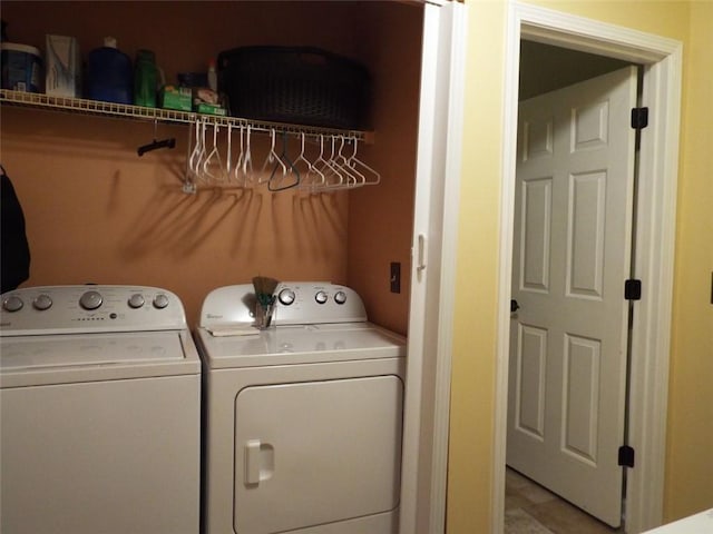 washroom with independent washer and dryer