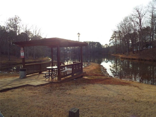 view of yard with a gazebo and a water view