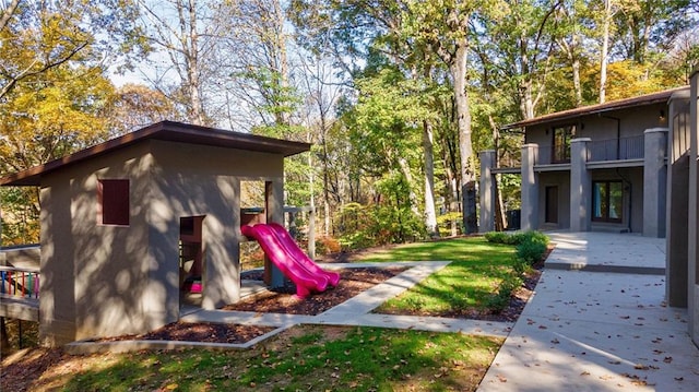 view of yard with a playground