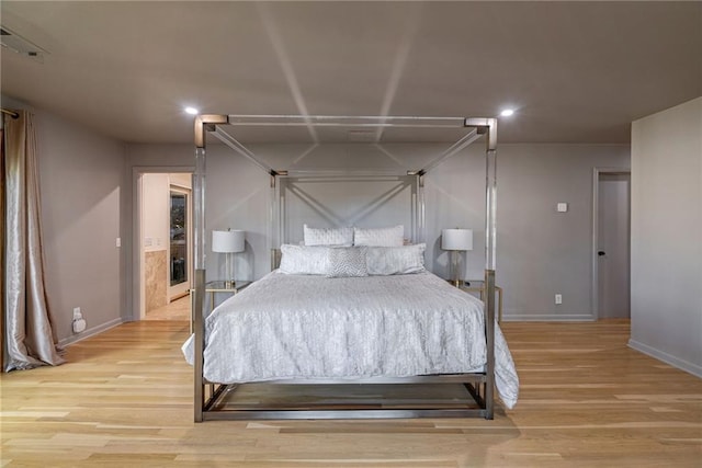 bedroom featuring light wood-type flooring