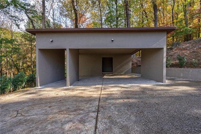 garage with a carport