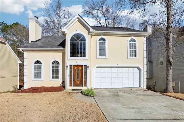 view of front of home with a garage