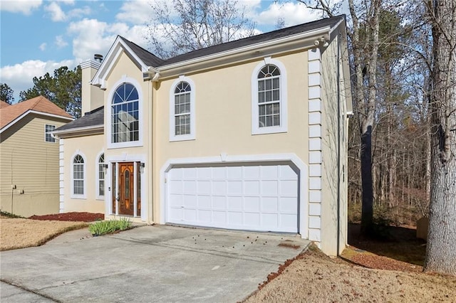 view of front of house with a garage