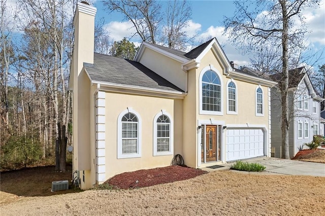 view of front of property with a garage