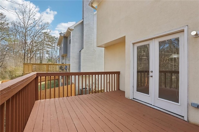 wooden terrace featuring french doors