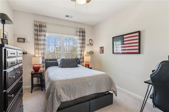 5807 Peacock Ln, Hoschton, GA 30548 - carpeted bedroom with a ceiling fan, baseboards, and visible vents