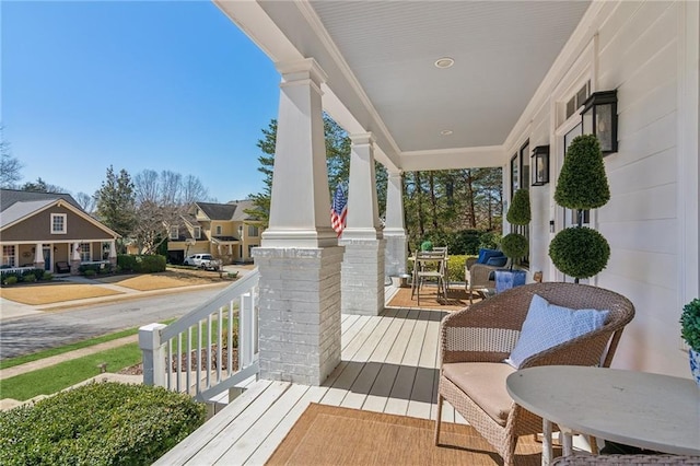 5807 Peacock Ln, Hoschton, GA 30548 - deck with a residential view and covered porch