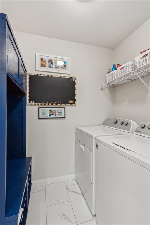5807 Peacock Ln, Hoschton, GA 30548 - clothes washing area featuring baseboards, marble finish floor, laundry area, and washer and clothes dryer