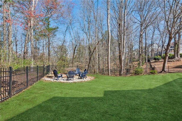 5807 Peacock Ln, Hoschton, GA 30548 - view of yard with an outdoor fire pit and fence