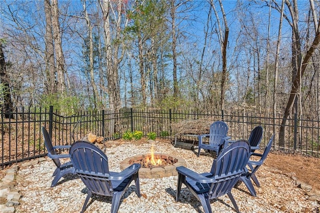 5807 Peacock Ln, Hoschton, GA 30548 - view of yard featuring a fire pit and fence