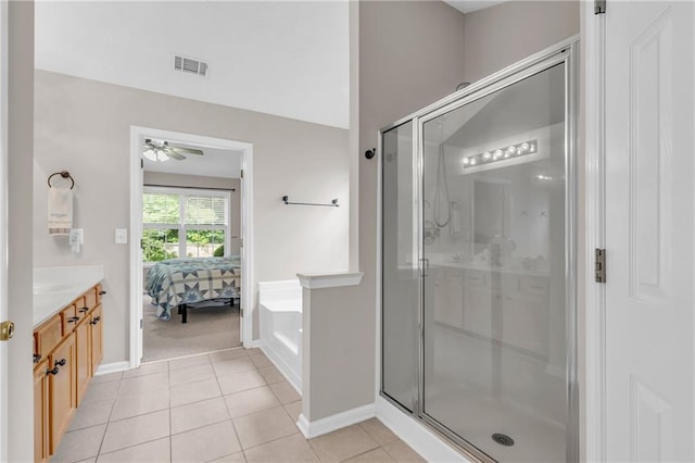 1530 Brisbane Dr, Dacula, GA 30019 - ensuite bathroom with a shower stall, ceiling fan, vanity, a bath, and tile patterned floors