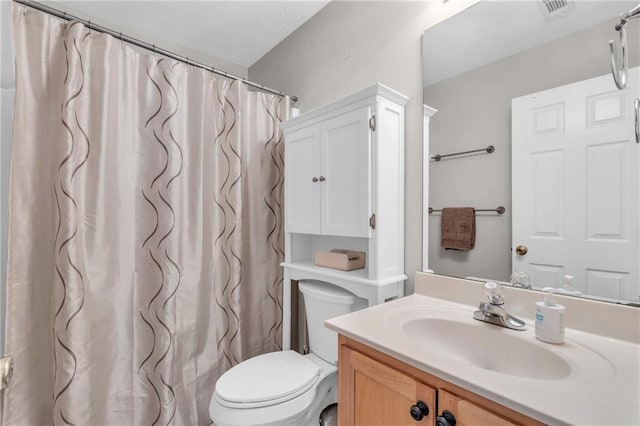 1530 Brisbane Dr, Dacula, GA 30019 - bathroom featuring vanity, a textured ceiling, and a shower with curtain
