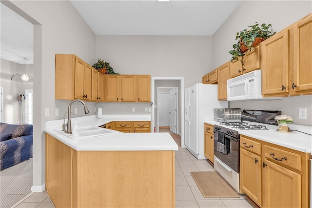 1530 Brisbane Dr, Dacula, GA 30019 - kitchen featuring white appliances, light tile patterned floors, light countertops, a peninsula, and light brown cabinets