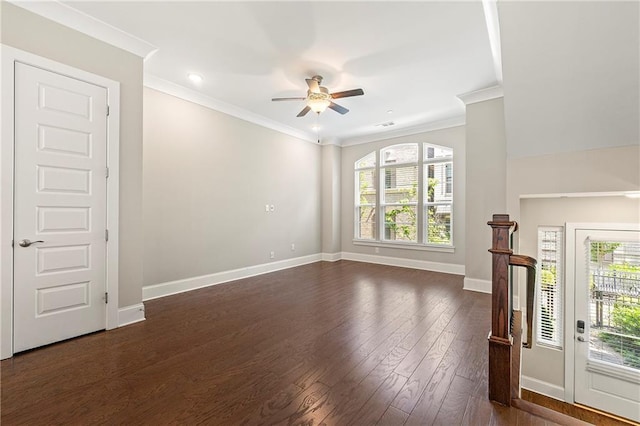 interior space featuring dark wood-style floors, plenty of natural light, and ornamental molding