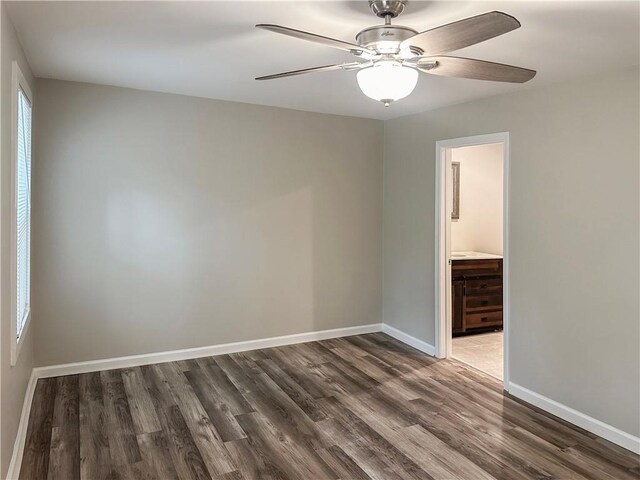 unfurnished room with ceiling fan and hardwood / wood-style floors