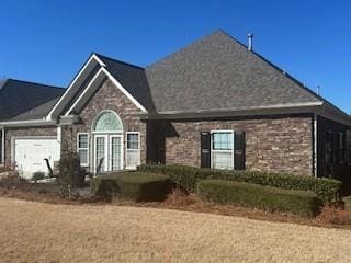 3311 Lindenridge Dr, Buford, GA 30519 - view of front facade featuring stone siding