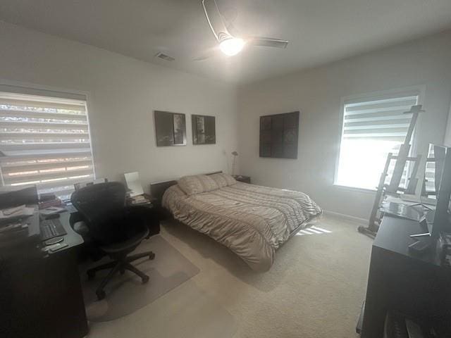 3311 Lindenridge Dr, Buford, GA 30519 - carpeted bedroom featuring an office area and ceiling fan
