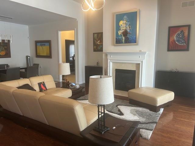 3311 Lindenridge Dr, Buford, GA 30519 - living room featuring wood finished floors and a fireplace