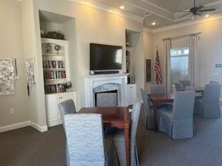 3311 Lindenridge Dr, Buford, GA 30519 - dining space with ornamental molding, a fireplace, a ceiling fan, recessed lighting, and coffered ceiling
