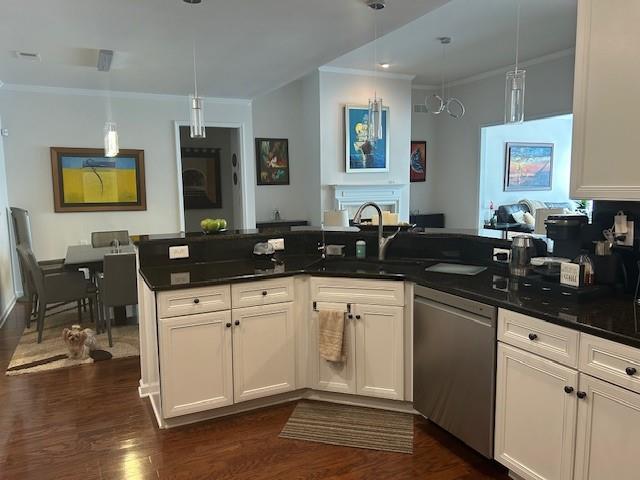 3311 Lindenridge Dr, Buford, GA 30519 - kitchen featuring dishwasher, ornamental molding, dark wood-style floors, white cabinets, and hanging light fixtures