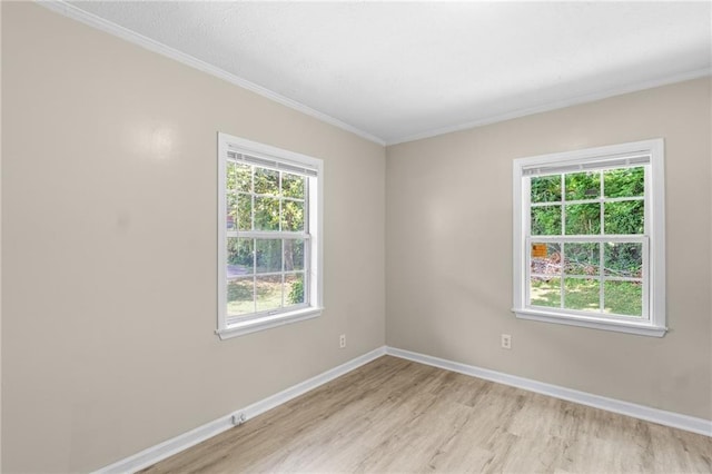 354 Henry Aaron Ave SW, Atlanta, GA 30310 - unfurnished room featuring light wood-style flooring, ornamental molding, and baseboards