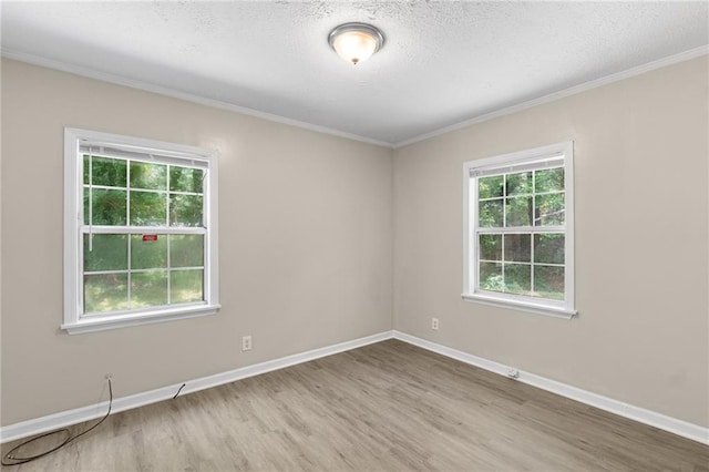 354 Henry Aaron Ave SW, Atlanta, GA 30310 - spare room with wood finished floors, crown molding, baseboards, and a textured ceiling