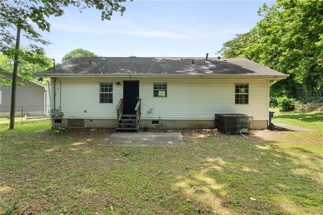 354 Henry Aaron Ave SW, Atlanta, GA 30310 - rear view of house featuring entry steps, a yard, a patio, crawl space, and central air condition unit