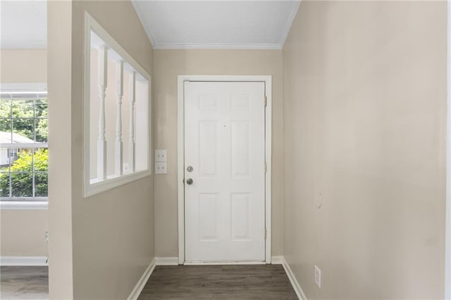 354 Henry Aaron Ave SW, Atlanta, GA 30310 - entryway featuring dark wood-style flooring, baseboards, and crown molding