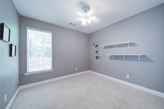 1575 Parkside Village Dr, Cumming, GA 30040 - spare room featuring a ceiling fan, carpet flooring, and baseboards
