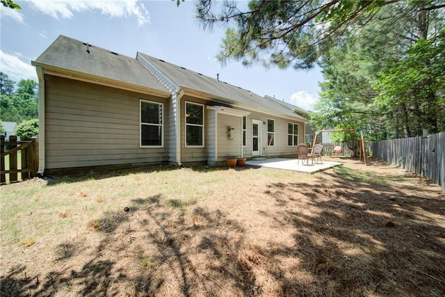 1575 Parkside Village Dr, Cumming, GA 30040 - back of house featuring a patio area and a fenced backyard