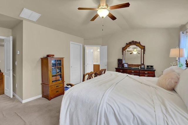 bedroom featuring light carpet, baseboards, visible vents, a ceiling fan, and lofted ceiling