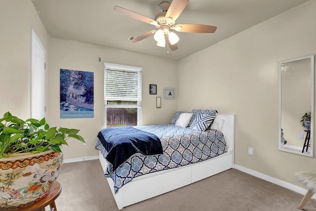 bedroom featuring visible vents, carpet flooring, ceiling fan, and baseboards