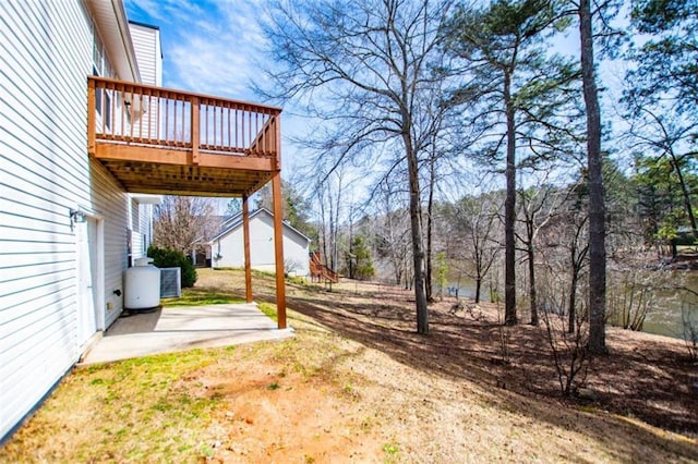 view of yard with a deck and a patio area