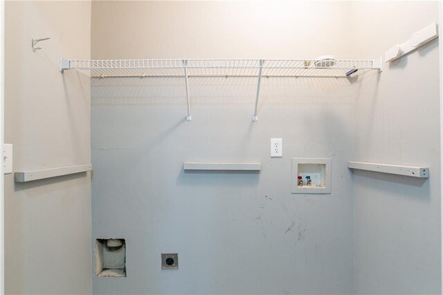 laundry room with hookup for an electric dryer and hookup for a washing machine