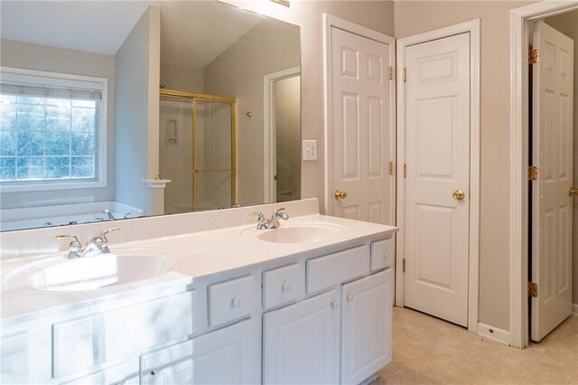 bathroom with tile patterned floors, vanity, lofted ceiling, and plus walk in shower